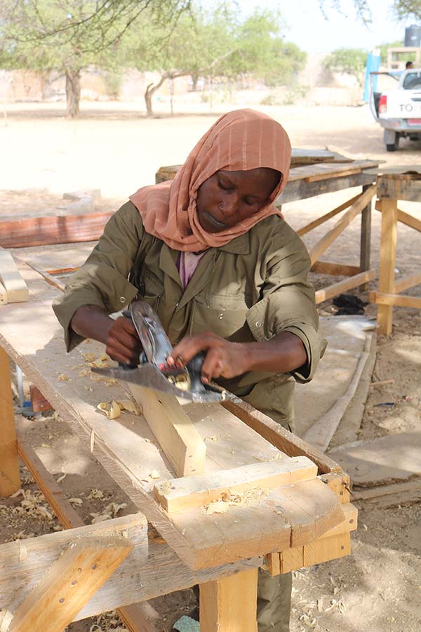 carpenter working at bench in Chad