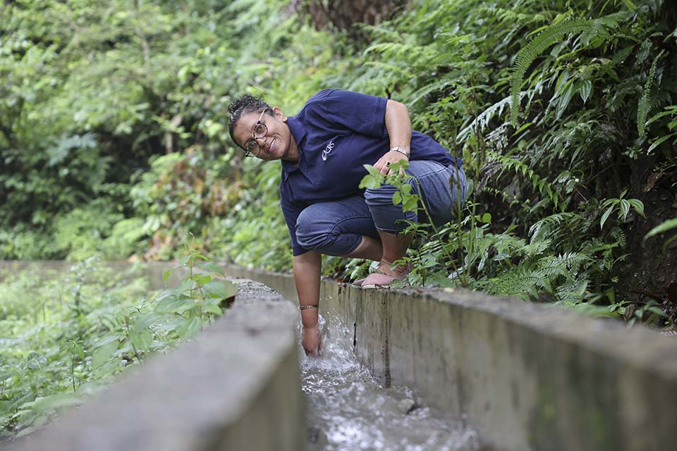 CRS Field Officer Goumaya Bhujel near an irrigation canal