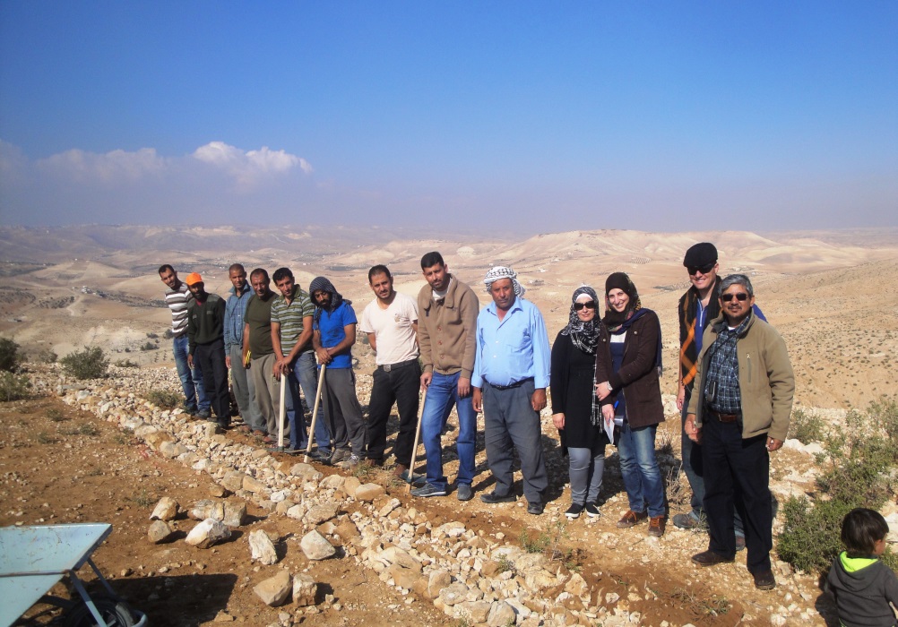 Local herders, partner organization staff and CRS staff after completing training on constructing contour walls for soil and water conservation. Fellow Daniel Pasquini-Salazar is second from right.