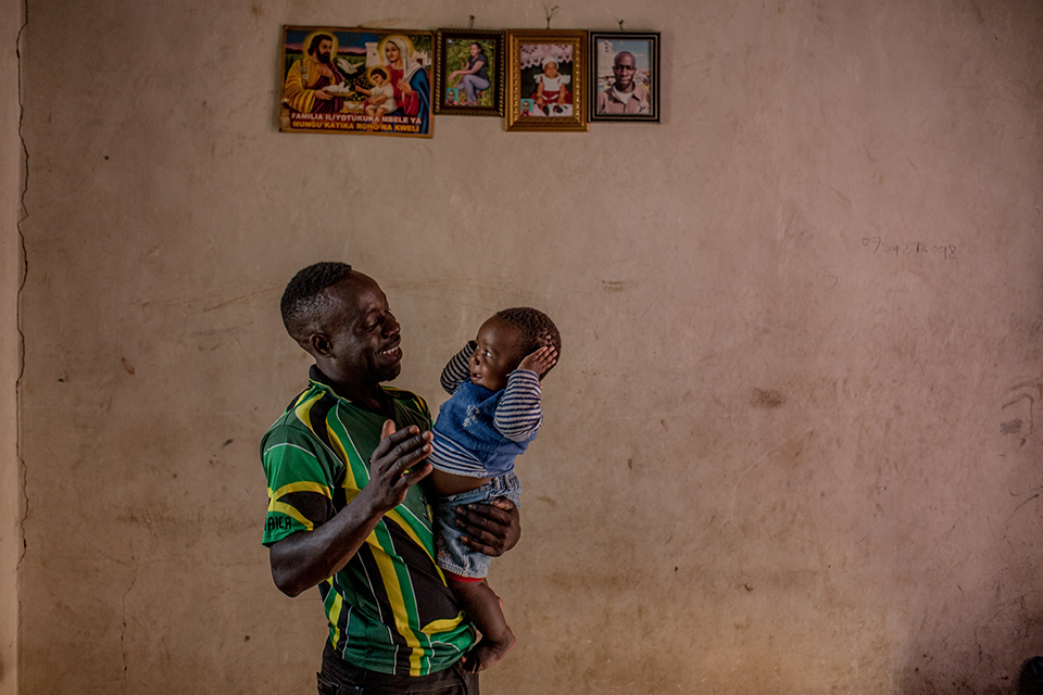 father holds daughter in tanzania