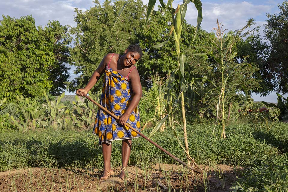 Madagascar farmer in her field