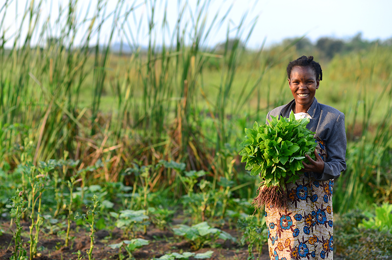 In Tanzania, Mama Teddy used seeds from CRS to grow healthy food--both for sale and to feed to her three children.