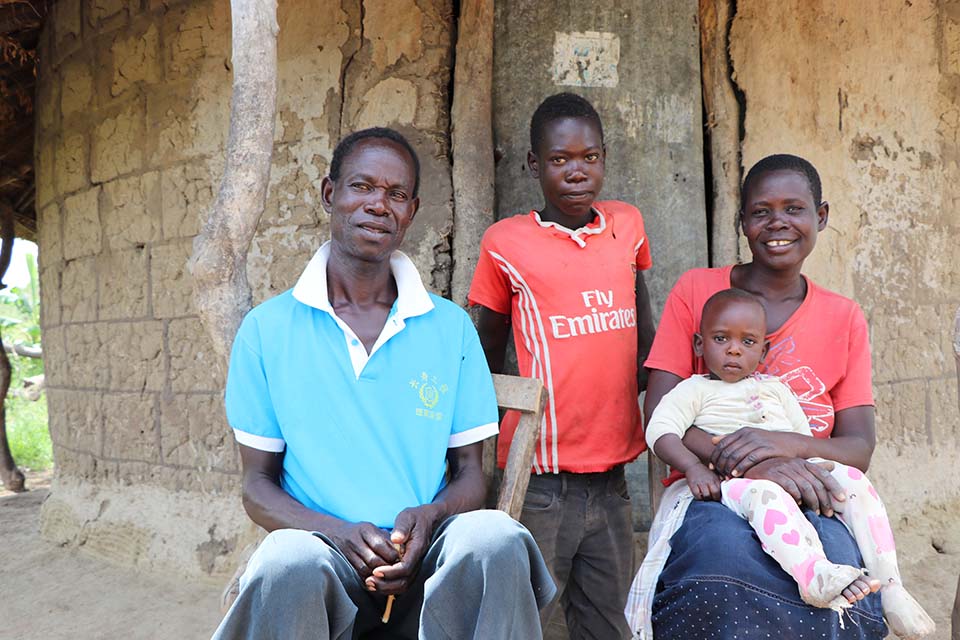 family in Uganda after flooding