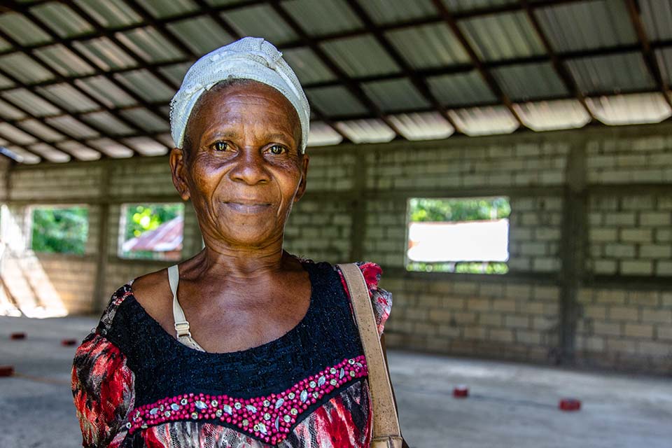 woman faces camera in Haiti.