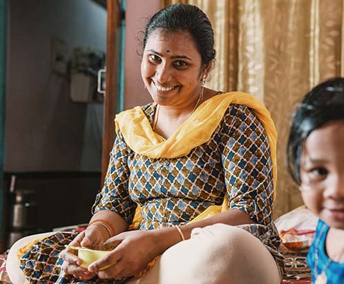 woman in India smiling facing camera