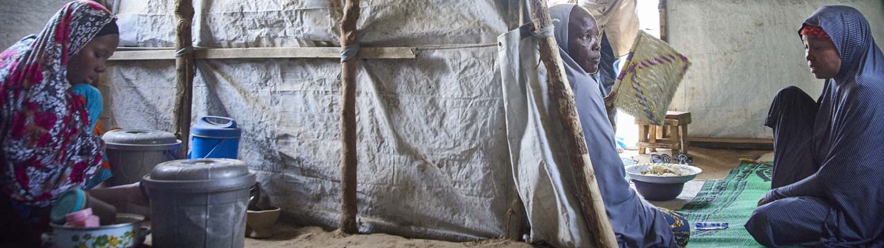 Building Shelters For Nigerians Displaced By Violence CRS   Women Inside Nigeria Shelter Nie201947844 