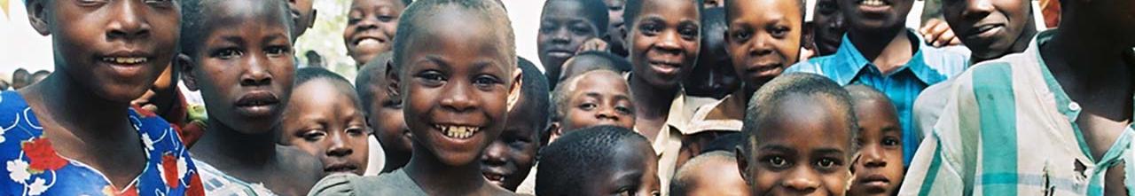 Tanzanian children smiling at camera