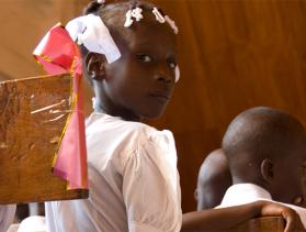 A mass baptism at the cathedral in Gonaives, Haiti. David Snyder for CRS