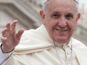 Pope Francis waves facing camera