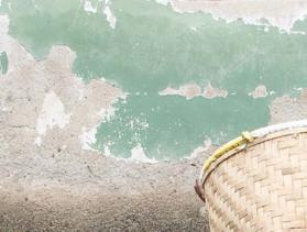 woman holding basket in Tanzania